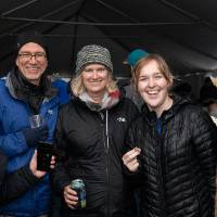 group photo in the alumni tent